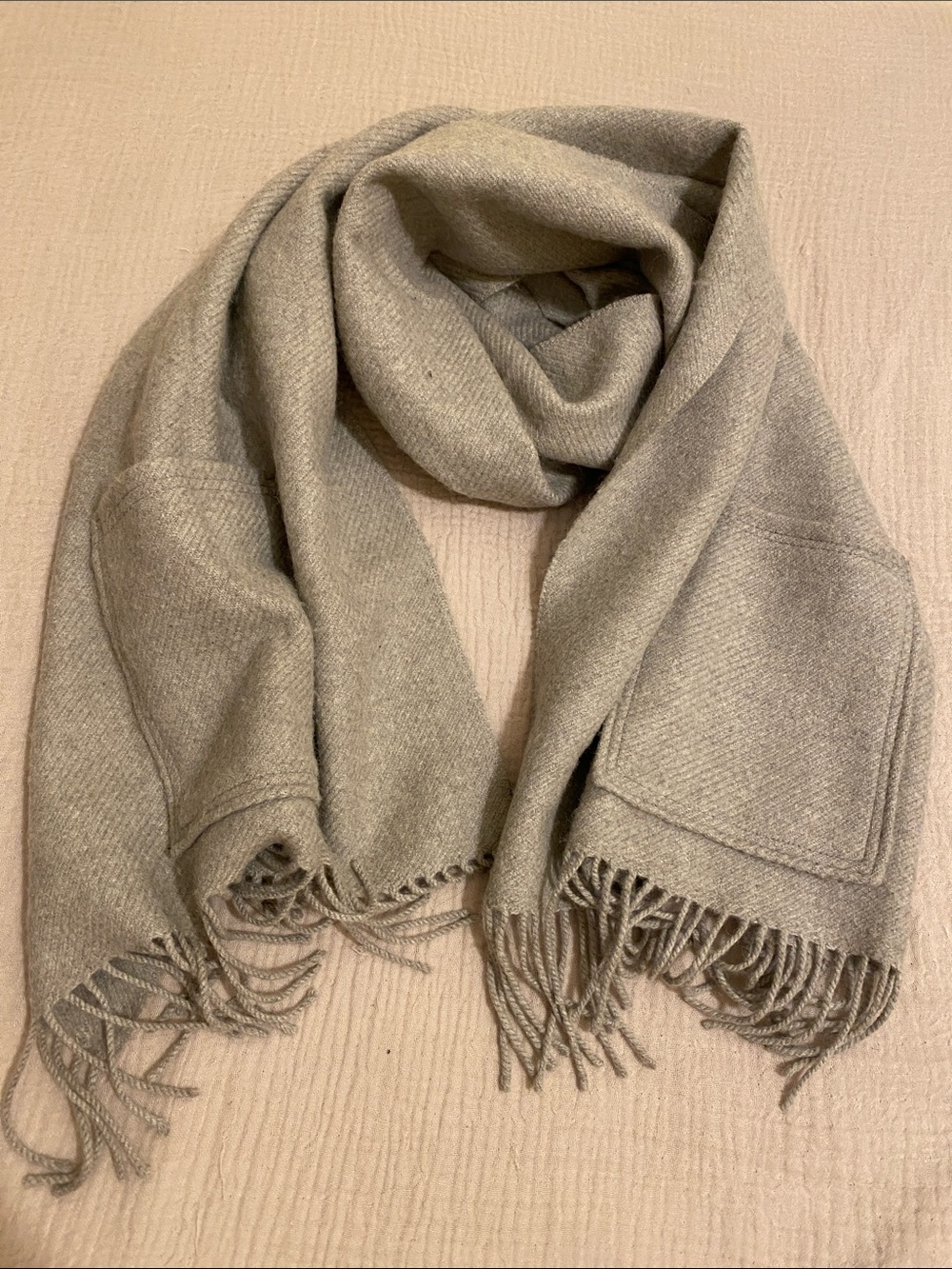 Muji Wool gray scarf with pockets.